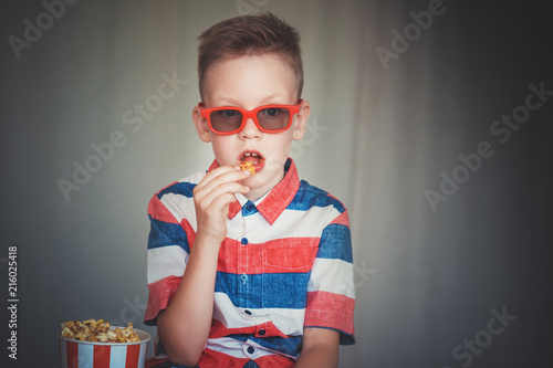 Young Boy Watch A Movie In 3d Glasses At The Cinema Or At Home