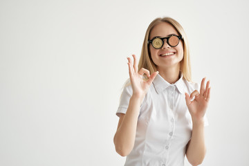 Wall Mural - business woman signs fingers bitcoin