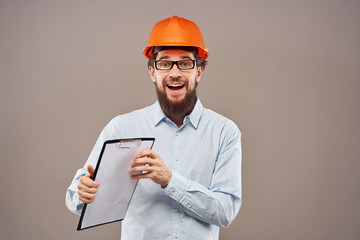 happy architect in helmet