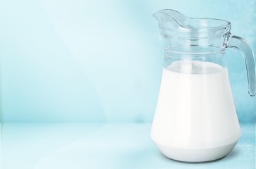 Canvas Print - Glass jug of fresh milk