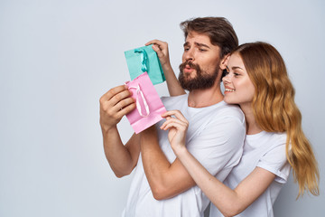 young couple with holiday gifts