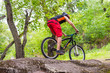 © mihakonceptcorn - Concept of an active lifestyle, a cyclist riding the rocks.