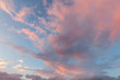 © mreco - Beautiful clouds and blue sky background at sunset with pink and purple tones over England UK. Cloudscape and skyscape backdrop 0162