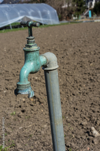 Old Water Pipe Faucet With Nature Brown Earth Background A Old