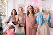 © zinkevych - Successful women. Company of four beautiful successful women making photo during baby shower