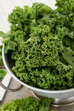 Fototapeta Kuchnia - preparing fresh kale leaves