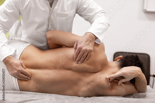 Cuadros en Lienzo Orthopedist examining patient in hospital