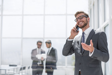 happy businessman talking on mobile