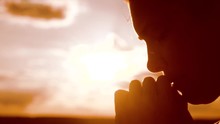 The Girl Prays. Girl Folded Her Hands In Prayer Silhouette At Sunset. Slow Motion Video. Girl Folded Lifestyle Her Hands In Prayer Pray To God. Girl Praying Asks Forgiveness For Sins Of Repentance