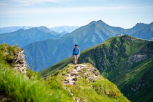 Woman Hiking On Mountain Path Above Gastein, Salzburg, Austria
