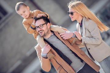 Wall Mural - Happy family in the city