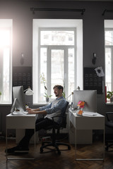 A man working in a modern design office 