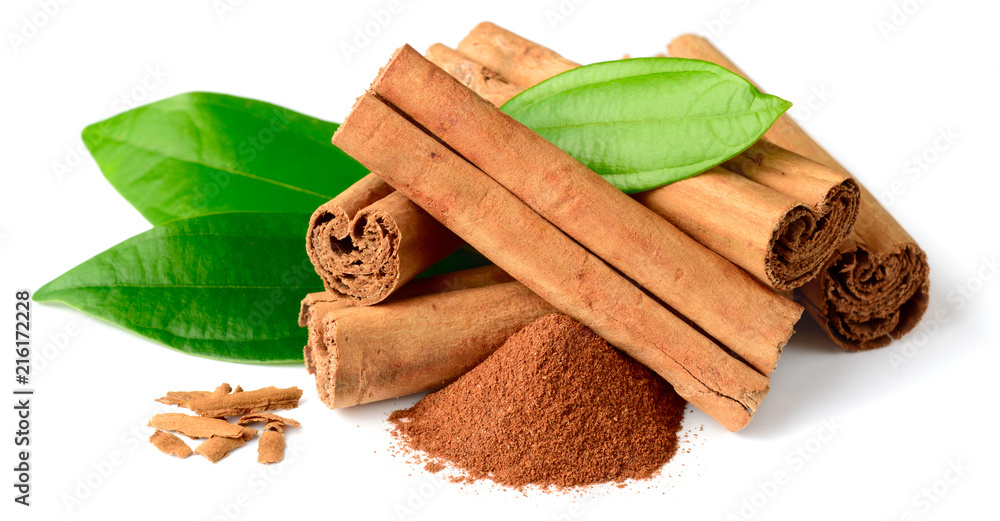 cinnamon powder and sticks with fresh leaves isolated on the white background - obrazy, fototapety, plakaty 
