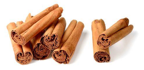 Poster - cinnamon sticks isolated on the white background