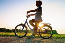 Little Boy Riding Bike At Sunset, Kids Sport