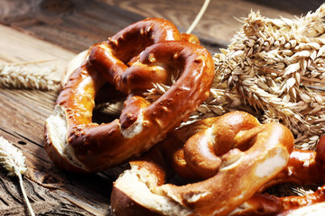 Wall Mural - German pretzels with salt close-up on the table