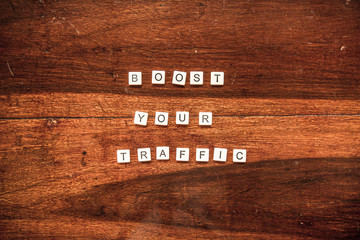 Word tiles on a wooden background