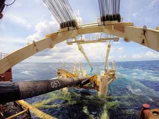 Pipe lay stinger is attached to the stern of pipe lay vessel during offshore pipeline installation.