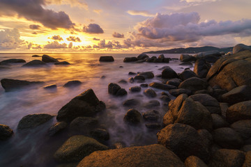 landscape long exposure Sunset beach and sea rock