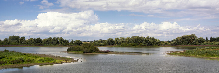 Beautiful panoramaview on the Oude Maas and Groenlanden in the polder landscape of the Ooijpolder. Part of the nature reserve Gelderse Poort near Nijmegen and river Waal, province Gelderland, NL