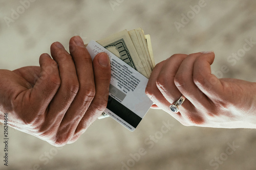 Financial And Accounting Fraud Illegal Money Withdrawal Tax Financial And Accounting Fraud Illegal Money Withdrawal Tax Dodging Two Pairs Of Hands Exchanging Electronic Currency For Cash