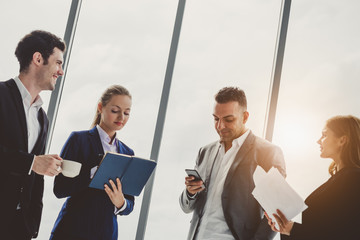 Group of business people talking and meeting in office, teamwork concept