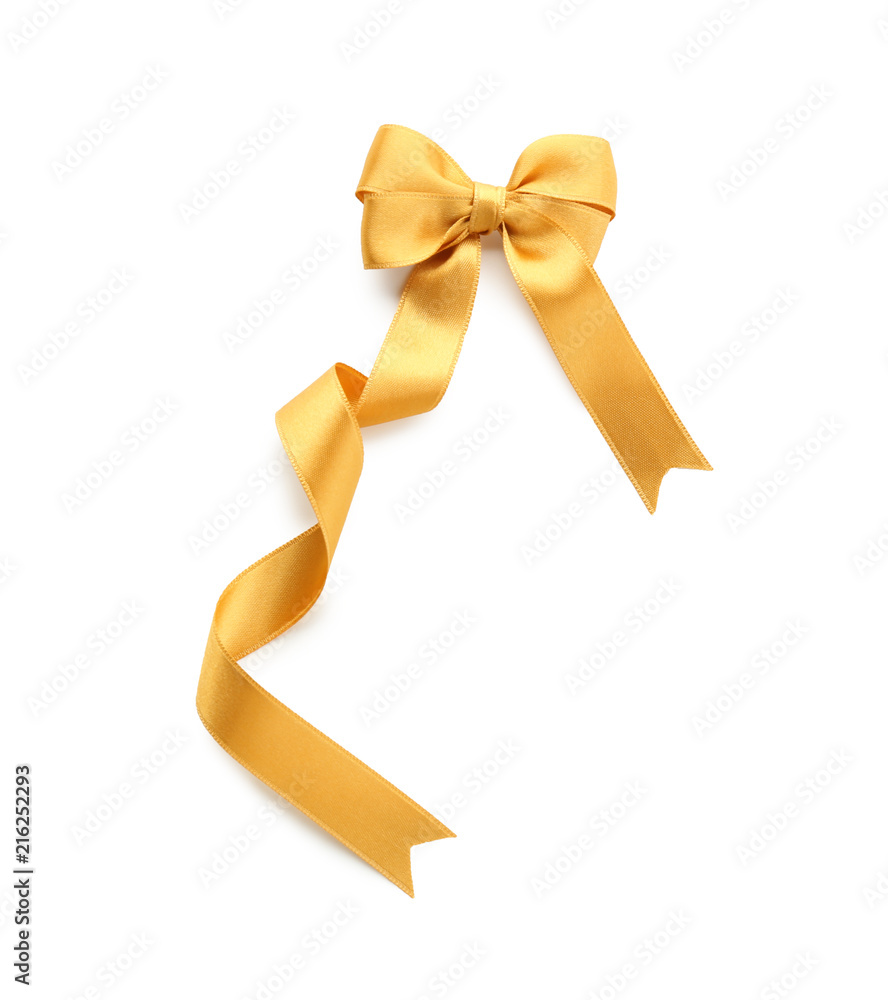 Beautiful bow from golden ribbon on white background