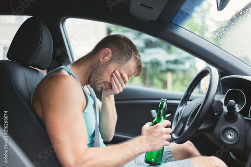 Cuadros en Lienzo Drunk driver behind the steering wheel of a car