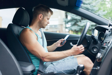 Careless driver using a mobile phone whilst driving