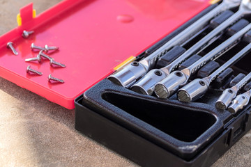 Wall Mural - set of socket wrenches in a case, close up, selective focus