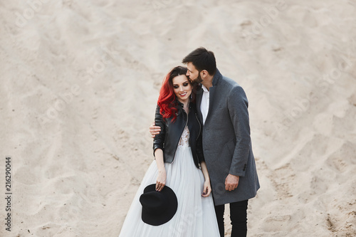 Fashionable And Stylish Couple Sexy Model Girl With Red Hair And