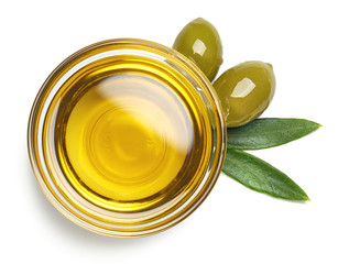 Poster - Bowl of olive oil and green olives with leaves