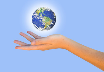 Wall Mural - Planet earth on palm.Elements of this image furnished by NASA