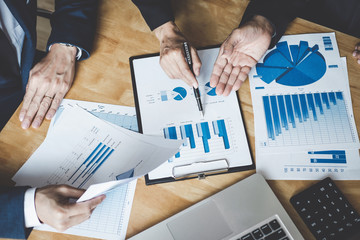 Leinwandbilder - Executive team discussing the charts and graphs working in business strategy and financial plan to investment profit, discussing working analysis with financial data and marketing growth report