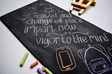 Inspirational motivating quotes on chalkboard background. 