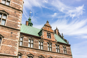 Rosenborg Castle Gardens in Copenhagen, Denmark.  Built in the Dutch Renaissance style in 1606, the castle was used by Danish regents as a royal residence.