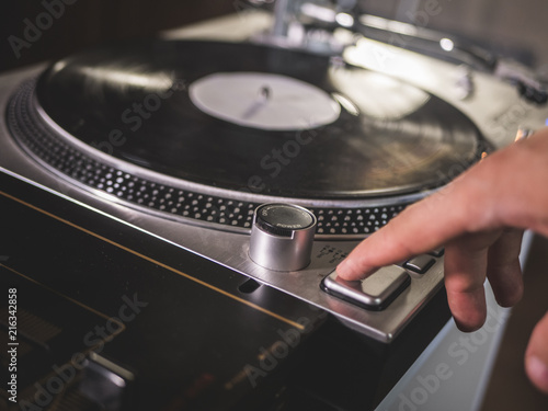 Close Up Hand Push Start Play Button On A Vintage Vinyl Records Turntable Gramophone Player Stock Photo Adobe Stock Close Up Hand Push Start Play Button On A Vintage Vinyl Records Turntable Gramophone Player Stock Photo Adobe Stock