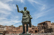 Looking up at the statue of Julius Caesar in Via dei Fori Imperiali, Rome