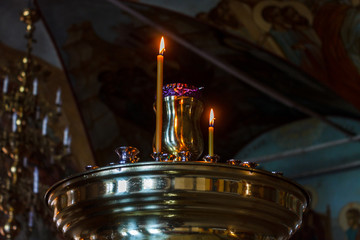 Altar with burning candles.