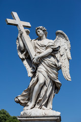 Wall Mural - Angel with the cross sculpture by Ercole Ferrata on the Pont Sant'Angelo bridge in Rome