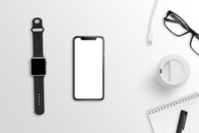 Smart Mobile Phone And Watch On Clean Office Desk. Black And White Composition. Flat Lay.