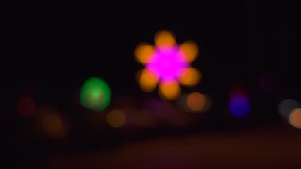 Canvas Print - Blurred abstract background colorful lights at Night in the Amusement Park