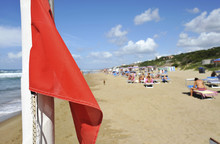 A Red Warning Flag On The Beautiful Beaches Of The Tyrrenian Sea.  Sabaudia, Lazio, Italy