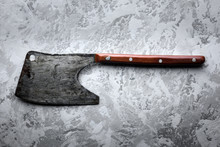 Old Rustic Axe For Meat On Grunge Background. Food Photography