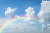 Fototapeta Tęcza - Cloudscape with blue sky and white clouds rainbow