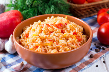 Bowl full of rice with tomatoes