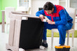 © Elnur - Repair contractor repairing broken furniture at home