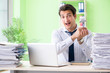 © Elnur - Businessman having problems with paperwork and workload