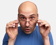 © spaxiax - surprised bald guy looking at camera