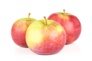 Group of three whole fresh red apple james grieve variety isolated on white background